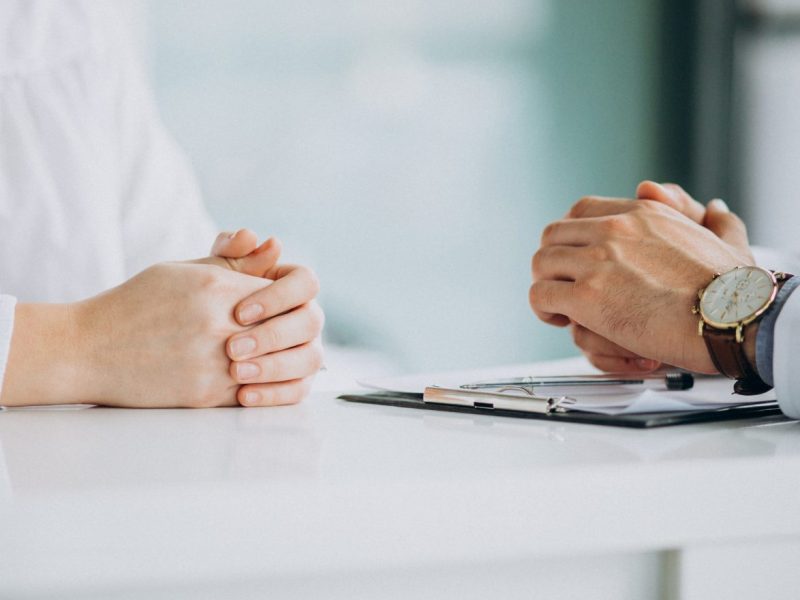 physician-consulting-his-patient-clinic